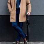 Stay Dry In Style: 10 Stylish Umbrellas To Keep The Rain Away 7 Man with stylish umbrella