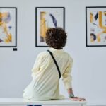 Is collecting art worth it? 2 woman admiring art
