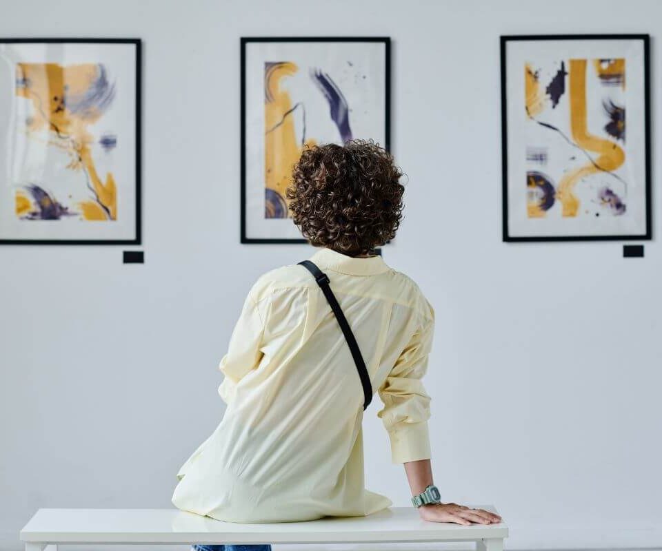 woman admiring art