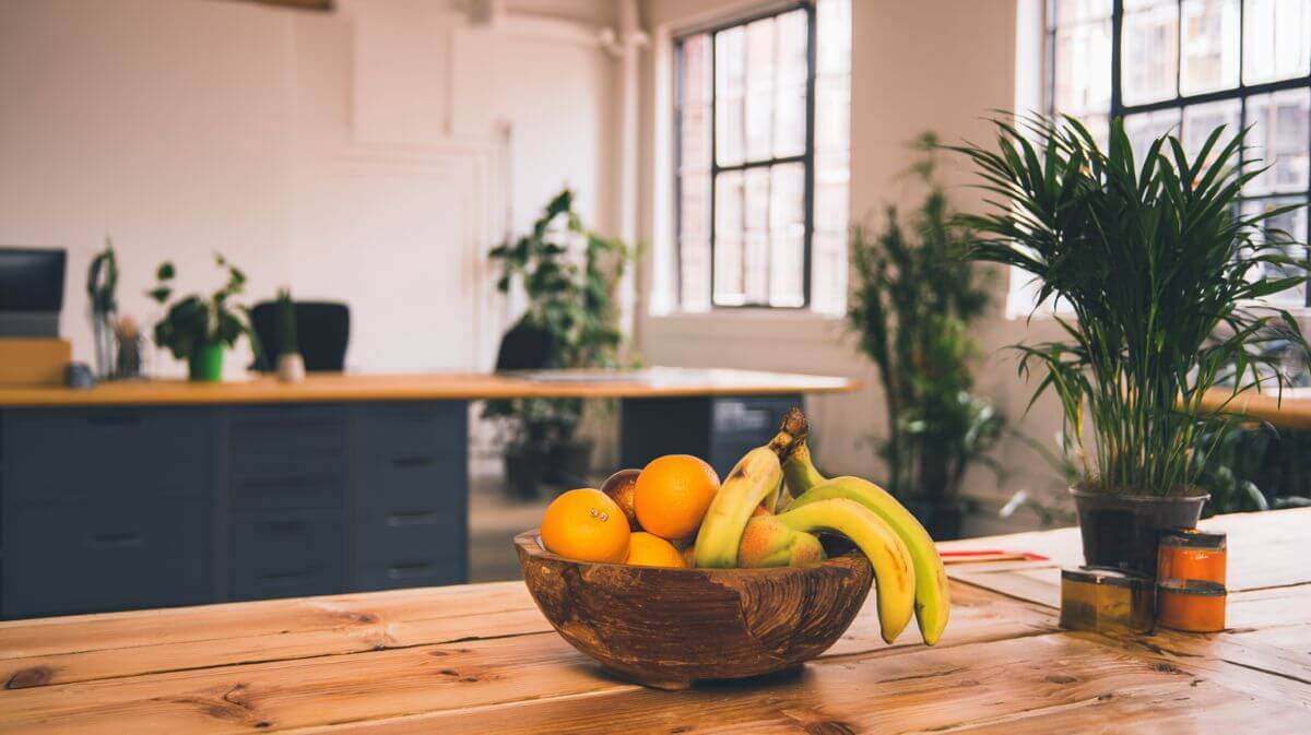 How to Bring the Creative Studio Vibe into your Office Space 2 bowl of fruit in office
